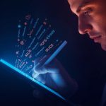 A copywriter typing on a glowing laptop as golden words and dollar symbols flow outward, symbolizing how powerful copywriting converts words into sales.