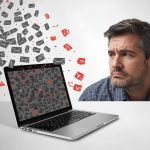 A marketer smiling as glowing personalized emails fly from a laptop and turn into coins and hearts, symbolizing the power of email personalization to increase sales.