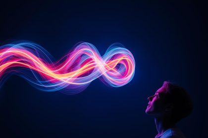 A glowing motion trail forming a brand visual as a marketer watches, symbolizing how animation captures attention and drives digital marketing success.