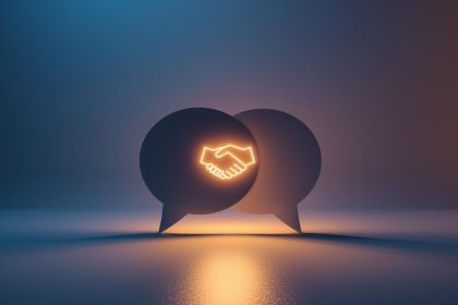 Two glowing chat bubbles — one human, one AI — overlapping with a handshake icon inside, symbolizing conversational marketing that builds trust and conversions.