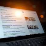 A glowing red map pin rises from a smartphone displaying a city map, symbolizing how mastering local search drives faster customer discovery.