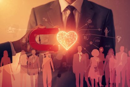 A marketer uses a glowing heart-shaped magnet to attract a diverse audience tagged with demographic data, symbolizing how focus drives deeper marketing engagement.