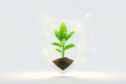 A marketer in front of a glowing lock-shaped graph rising upward, symbolizing growth through secure and privacy-first data marketing.