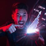 A digital creator pointing at a glowing smartphone screen showing viral engagement numbers, symbolizing the power of short-form video to drive attention and conversions.