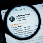 A marketer reviewing a holographic checklist of Google’s E-E-A-T factors — Expertise, Experience, Authoritativeness, and Trust — symbolizing content credibility in 2025.