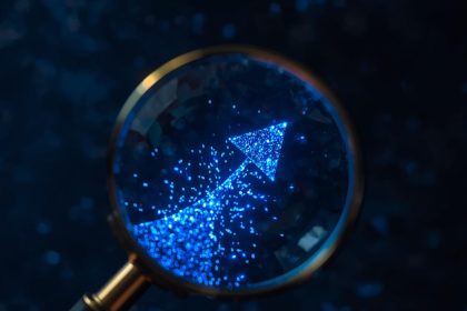 A marketer analyzing key performance metrics and digital benchmarks to measure campaign success and optimize marketing performance.