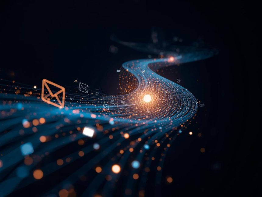 A marketer using an integrated CRM and email marketing system to create a seamless, personalized omnichannel customer journey.