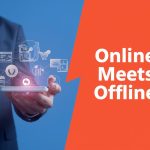 Marketer using a smartphone to connect digital and physical customer experiences, illustrating mobile’s central role in an omnichannel strategy.