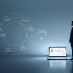 Marketer guiding a hero figure up a symbolic storytelling mountain representing the Hero’s Journey framework for digital marketing narratives.