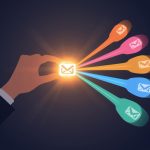 Marketer analyzing segmented email audiences on a data dashboard to improve conversions and campaign performance.