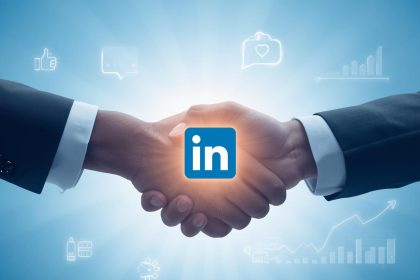 Two professionals shaking hands with a glowing LinkedIn logo, representing effective lead generation and conversion strategies in 2025.