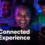 Customer engaging with a brand across multiple devices and channels, representing seamless omnichannel customer experience in 2025.