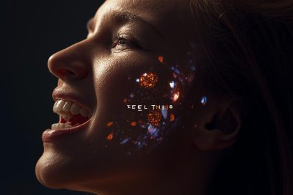 A person's face shows strong emotion, with glowing video elements projected onto their skin, subtly showing a brand.