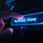 User pressing activation button on SaaS dashboard.