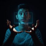 Person gazing at a glowing AI snippet box on a landing page.