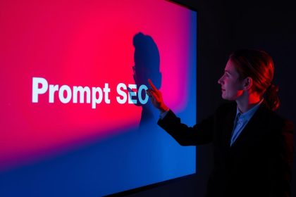 Marketer looking at glowing laptop symbolizing AI-powered SEO prompts