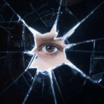 A cracked billboard glowing with light as a human eye appears behind the broken surface, symbolizing truth and authenticity emerging from within a brand façade.