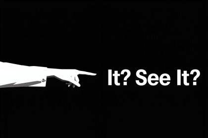 Person straining to read an email on screen, high contrast colors