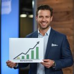 Confident analyst presenting a rising cohort retention heatmap on a big screen, showing strong week-4 returns with clear labels for Cohort Analysis for Retention.