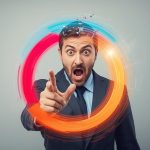 Person with an inspired expression pointing at a glowing circular flywheel diagram, symbolizing the Flywheel Approach to Customer Growth and AI-powered momentum.