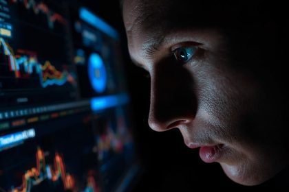 A marketer reacting emotionally to a glowing sustainability KPI dashboard showing verified performance metrics.