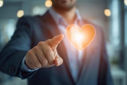 A creative designer tears a glossy, fake ad to reveal an authentic, transparent message underneath—symbolizing ethical advertising in 2025.