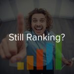 Focused marketer pointing at evergreen SEO content blocks on a screen, showing confidence and clarity about long-term rankings.