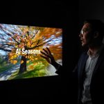 A focused digital marketer analyzing AI-powered seasonal branding visuals on a screen, showing curiosity and strategic insight.