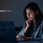 Marketer reacting with surprise while adjusting email preference settings on a laptop, illustrating email unsubscribe prevention using smart preferences.