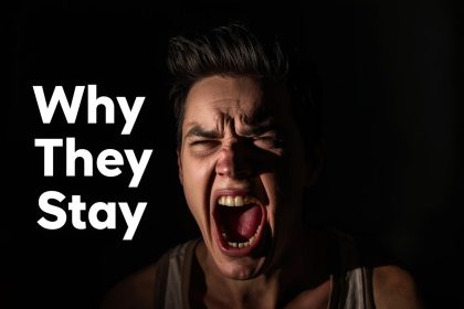 Smiling shopper reading positive community comments on a phone during holidays, showing trust and connection linked to community-driven holiday loyalty.