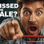 Smiling marketer pointing at abandoned cart notification, highlighting holiday e-commerce recovery emails that convert.