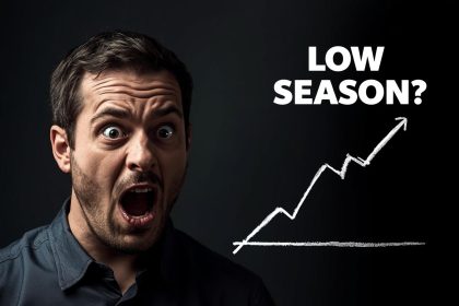 Affiliate marketer confidently reviewing analytics dashboard during low season, discovering hidden revenue opportunities through optimized strategy.